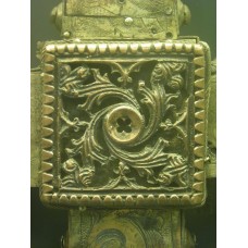 Rounded swastika with a solar cross in the center